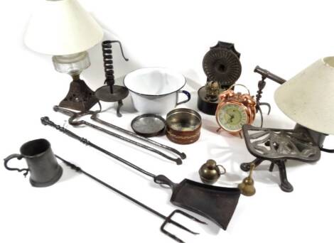 A 17thC style wrought iron candlestick, with entwined stem, shallow dish base and triple feet, with adjustable centre, 29cm H, part table lighter and further metalware, early pewter tankard, lamp, luncheon tin with leather covering, steel part fireside co