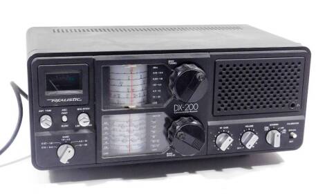 A Realistic DX-200 five band communication receiver, 36cm W, with paperwork.