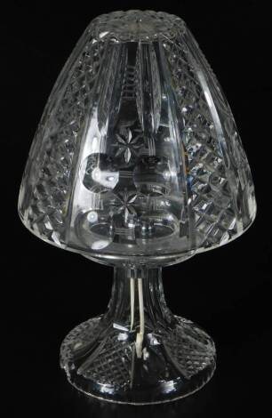 A cut glass table lamp, with shaped removable shade, on inverted stem and circular foot, hobnail cut with a repeat geometric pattern, unmarked, 34cm H.