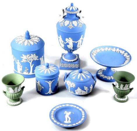 Various Wedgwood blue Jasperware, to include an urn vase with satyr mask handles, decorated with classical figures, on an inverted stem and square foot, 28cm H, lidded jar, another smaller, tazza, lidded sugar bowl, golfing saucer and two green Jasperware