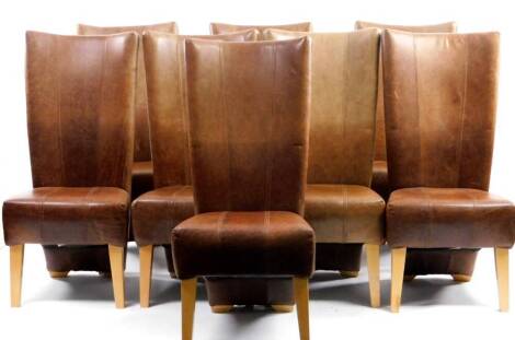 A high quality set of eight brown leather dining chairs, with high backs and deep shaped seats, square tapering legs, 117cm H, each seat 37cm D.