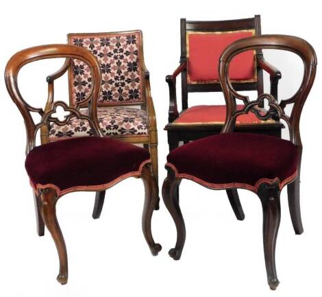 A 19thC mahogany elbow chair, with shaped arm supports and embroidered back and seat, in floral pattern, on square tapering legs terminating in spade feet, 88cm, and two Victorian balloon back dining chairs, on cabriole front legs.
