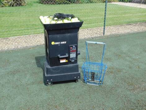 A Tennis Tower tennis ball dispensing machine, with accessories, 107cm H to include Hoag ball basket, original cost £1801. (key and owner manual in office)