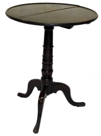 A 19thC stained pine tripod table, the circular moulded top on a gun barrel support terminating in cabriole legs, 70cm H, 58cm Dia.