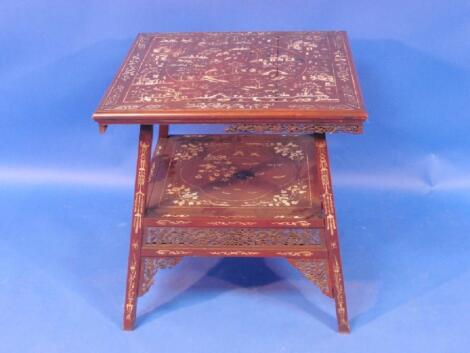 A 19thC Chinese rosewood centre table inset with ivory scenes of figures