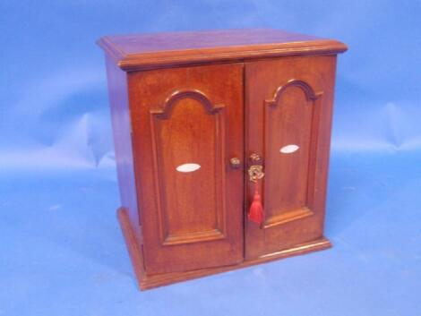 A Victorian mahogany collectors table chest or coin cabinet with an arrangement