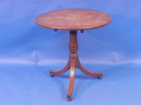 A 19thC mahogany supper table with circular folding top