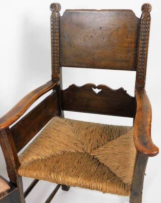 A 19thC ash and elm elbow chair, with enclosed arms, shaped cresting rail, carved roundels, rush seat, square pegged front legs joined by cylindrical stretchers, 99cm H, and a mahogany dining chair. - 2