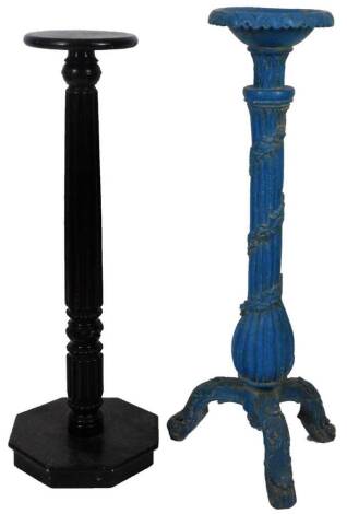 A 19thC torchere painted turquoise, with a shaped dish top raised on an entwined achanthus leaf stem, with acanthus capped triple feet, 119cm H, 33cm Dia. and a further torchere. (2)