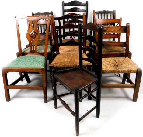 A collection of various 19thC and other rush seated chairs, to include country Chippendale example, a pair of Sheraton type with double cross splats and curved cresting rails, 85cm H, various other ash and elm chairs, ladder back example. (a large quanti