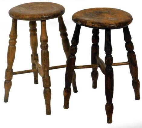 Two 19thC Boston style stools, with circular tops on quadruple legs joined by X stretchers, 54cm H, 32cm Dia. etc. (2)