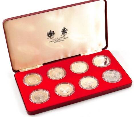 A Silver Jubilee Spink & Sons silver proof eight coin set, to include Seychelles, Mauritius, Gibraltar, St Helena, etc. in outer case with box and paperwork.