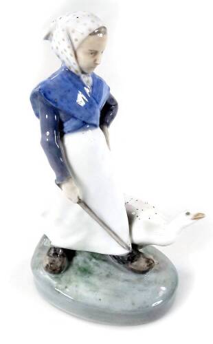 A Royal Copenhagen figure, of a farmhand aside goose, no. 528, 20cm H.