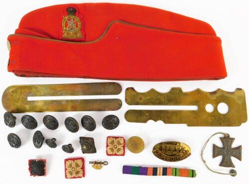 A Sharp Shooters hat, in red cloth with badge and button, 31cm W, a small quantity of other military buttons, badges, brass button cleaner, etc. (a quantity)