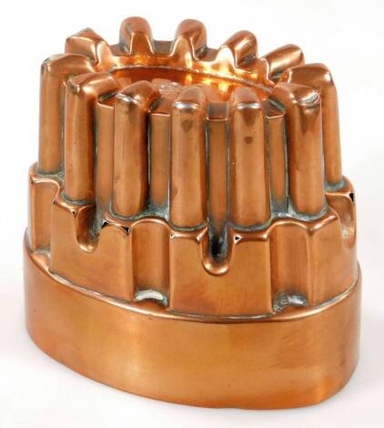 A Victorian oval copper jelly mould, by Benham & Froud, with tiered design, numbered 644, 14cm W.