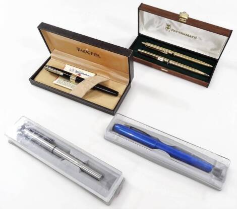 Various pens and pen sets, comprising a Sheaffer cased fountain pen in black and gilt trim, with gilt clip, 13cm W, a Parker chrome coloured pen, another in blue with chrome coloured clip and a two piece Papermate set. (a quantity in four cases)