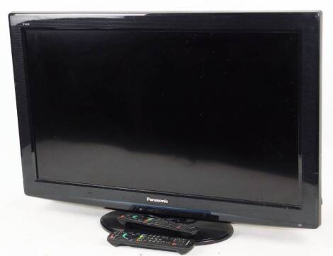 A Panasonic Viera 32" colour television, in black trim, with two remote controls and wire.