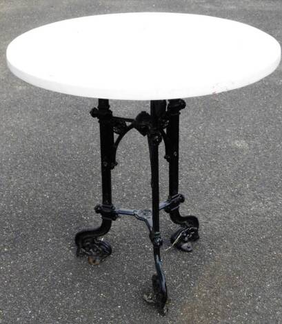 A Victorian style pub table, on triple scroll supports terminating in floral feet, with later circular wooden top, 76cm H, 76cm Dia.