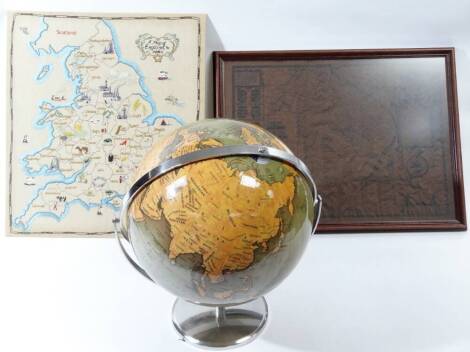 A terrestrial globe, on metal axis, 46cm high, an embroidered map of the British Isles and a further map after Speede. (3)