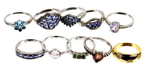 Ten modern silver dress rings, each stone set of varying designs, to include floral clusters, three stone design, half hoop eternity, cluster rings, etc. (10)