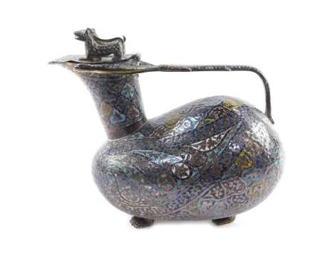 An 19thC Indian Kashmiri brass and enamel zoomorphic ewer, of bird form with a hinged lidded spout surmounted with two crouching lions, the handle formed as a serpent with its forked tongue extending, raised on four feet, decorated in champleve enamel wit