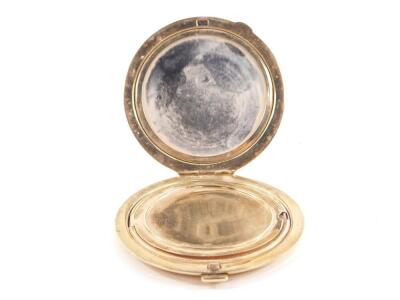 A 9ct gold circular cased compact, with engine turned decoration, opening to reveal an internal mirror and powder recess, Turner & Simpson Ltd, Birmingham 1984, 101.2g all in, cased. - 2