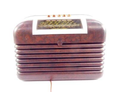 A Bush brown and cream bakelite radio type DAC.10, serial no. 62-37118, 35cm W.