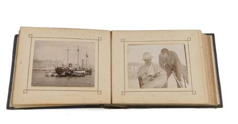 A Victorian photograph album showing views of Malta and Sicily, including war ships in the Grand Harbour Valetta, and military encampments.