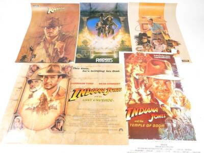 An Indiana Jones Quad film poster, Indiana Jones and the Last Crusade, further film poster, Indiana Jones and the Temple of Doom, 100cm x 64.5cm, and three Scanlite posters, Raiders of the Lost Ark, 88cm x 60cm. (5)