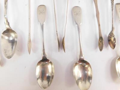 A pair of George III silver sugar tongs, Sheffield 1804, further pair London 1802, a pair of Victorian sugar tongs, Sheffield 1881, small pair of sugar tongs, Sheffield 1919, three George IV and Victorian teaspoons, London 1826 and 1862, and four further - 2