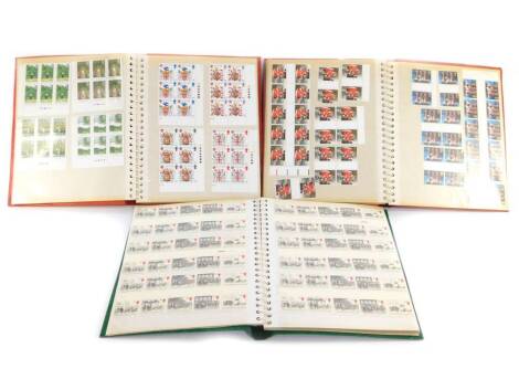 Philately. Mint commemorative traffic light six block sets, together with further mint commemorative stamps in blocks, repeats, part sheets, pairs, etc, in three albums.