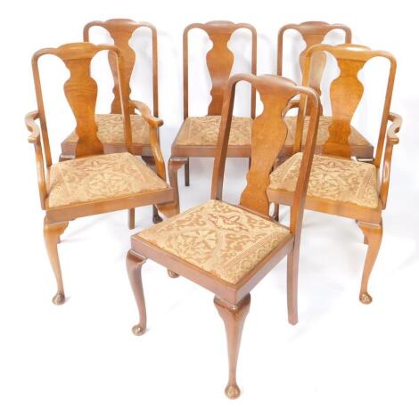 A set of early Georgian style walnut dining chairs, early 20thC, with vase shaped splats, drop in seats, raised on cabriole legs, comprising a pair of carvers, and four single chairs.