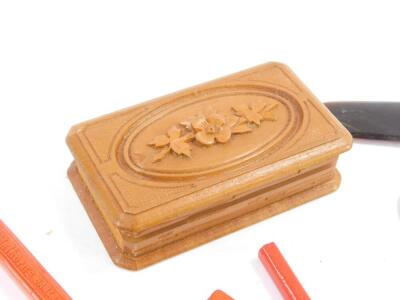 A late 19thC Continental carved wooden three division stamp box, decorated to the lid with Edelweiss, carved horn, mother of pearl and papier mache paper knives, porcupine quill, Walkden's Bank of England sealing wax, and a French bone handled seal, with - 3