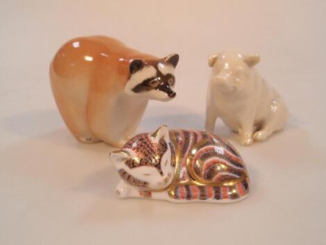 A Royal Crown Derby paperweight model of a sleeping cat