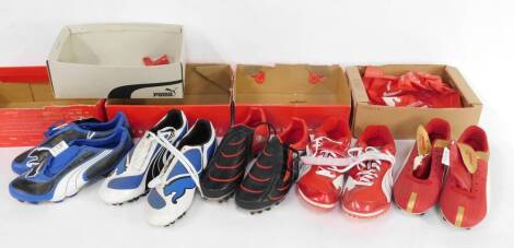 Six pairs of Puma football boots and running shoes, mixed styles and colours, some boxed.