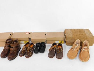 Three pairs of Timberland men's Chukka boots, UK size 6.5, together with mixed Timberland child's shoes and trainers, including black split rock, boat shoes, etc, all boxed. (8)