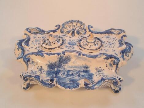 A 19thC Dutch Delft desk stand of ornate rococo scroll and scallop moulded design