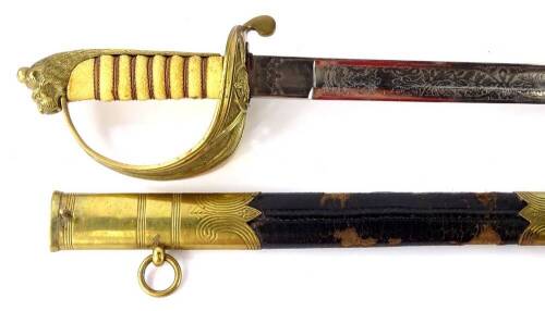 A late 19thC/ early 20thC naval sword, with brass and leather scabbard, the blade decorated a royal warrant, etc., the brass guard cast with an anchor motif and with a cream coloured shagreen handle, scabbard AF, 97cm L.