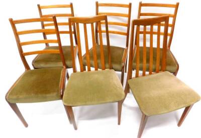 A set of four G-plan teak ladder back chairs, each with a padded seat, upholstered in green fabric, square tapering legs and two associated chairs. (6)