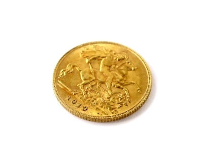 A George V half gold sovereign, dated 1913. - 2