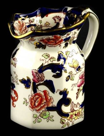 A Masons blue Mandalay pattern jug, with octagonal body, with Oriental famille rose decoration within a cobalt blue and gilt border, 16cm H, in original box.