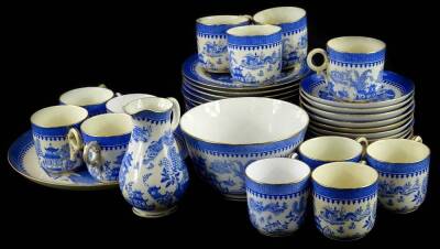 A Royal Worcester Willow pattern part tea service, printed in blue to include cups, saucers, etc.