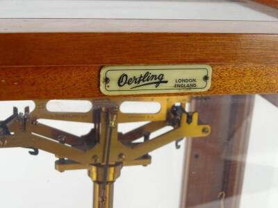 An Oertling set of laboratory of chemist scales, in a mahogany case, with adjustable feet, 30cm W. - 2