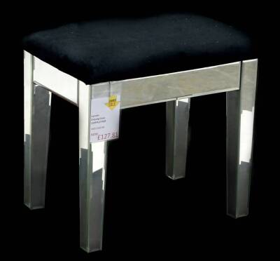 An ex shop display Birlea Camden stool, with a black padded seat, and mirrored sides and tapering legs, retail price was £169.99 reduced to £127.81.