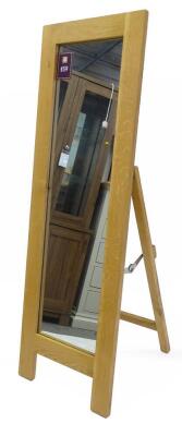 An ex shop display Hampton Court oak cheval mirror, with strut support, 48cm W, retail price was £229.99.