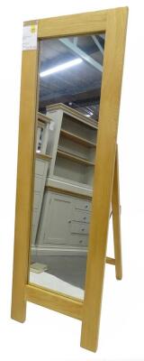 An ex shop display Hampton Court oak cheval mirror, with strut support, 48cm W, retail price was £229.99.