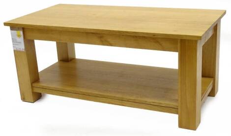 An ex shop display natural oak coffee table, with under tier, 44cm H, 100cm W, 50cm D, retail price was £419.99 reduced to £239.99