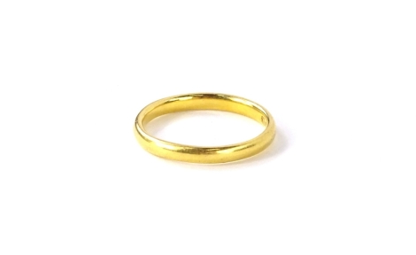 A 22ct gold wedding band, of plain design with makers stamp AJL, ring size J½, 2.3g.