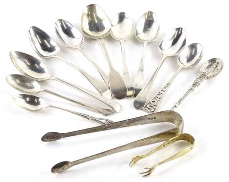 A collection of silver spoons, tongs, etc., 6¼oz.