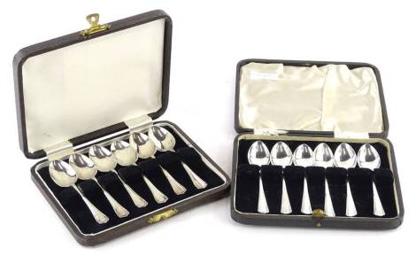 Two sets of six silver teaspoons, each in a fitted case, 5¼oz overall.